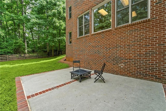 view of patio featuring an outdoor fire pit