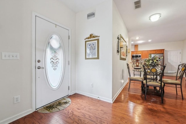 119 Holiday Rd, Unit Buford, GA 30518 - foyer featuring light wood-type flooring and baseboards