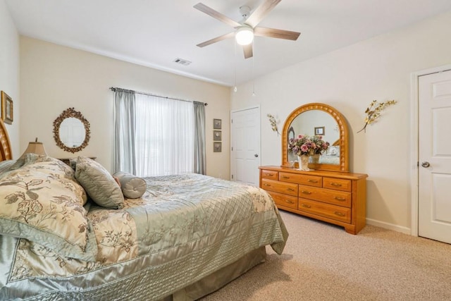 119 Holiday Rd, Unit Buford, GA 30518 - bedroom with light colored carpet and ceiling fan