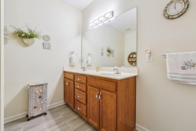 119 Holiday Rd, Unit Buford, GA 30518 - full bath featuring double vanity and wood tiled floors