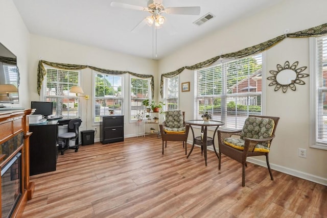 119 Holiday Rd, Unit Buford, GA 30518 - home office with light wood-style floors, healthy amount of natural light, and a ceiling fan