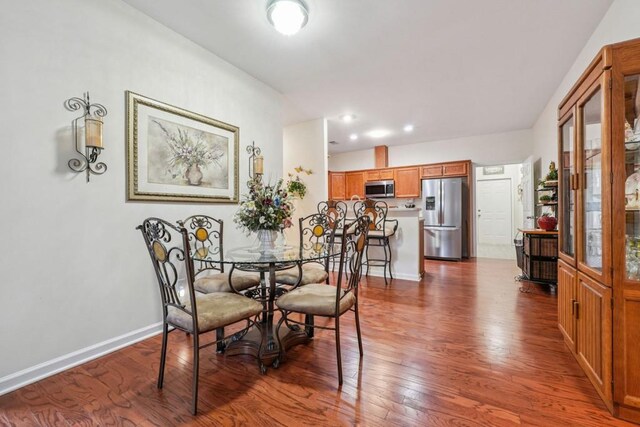 119 Holiday Rd, Unit Buford, GA 30518 - dining area featuring dark wood-style floors and recessed lighting