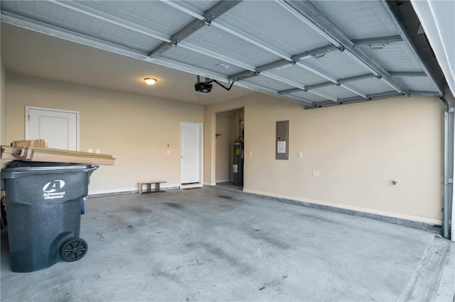 garage featuring a garage door opener, electric panel, and water heater