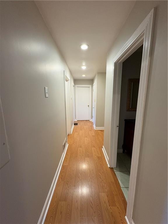 2807 Mcclave Dr, Doraville, GA 30340 - hallway with baseboards, light wood-style flooring, and recessed lighting