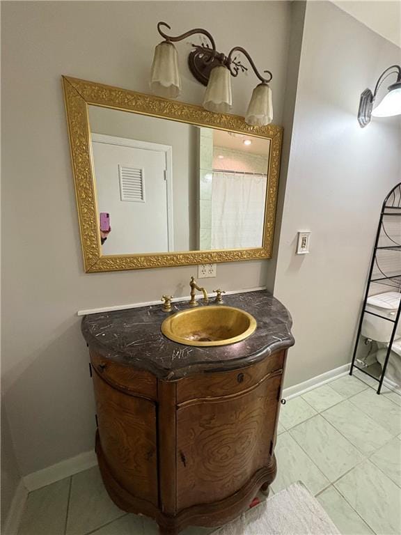 2807 Mcclave Dr, Doraville, GA 30340 - full bath with vanity, baseboards, and tile patterned flooring
