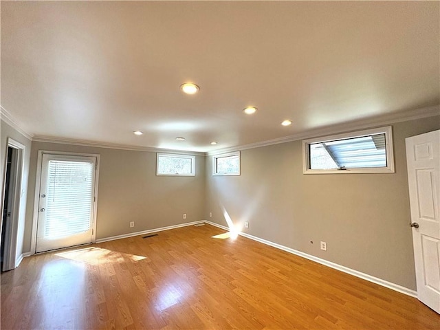 2807 Mcclave Dr, Doraville, GA 30340 - unfurnished room featuring crown molding, light wood-type flooring, baseboards, and recessed lighting