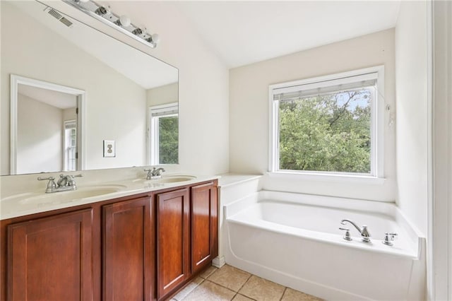 626 Pecan Knoll Dr Unit 13, Marietta, GA 30008 - full bathroom featuring double vanity, a bath, and tile patterned flooring