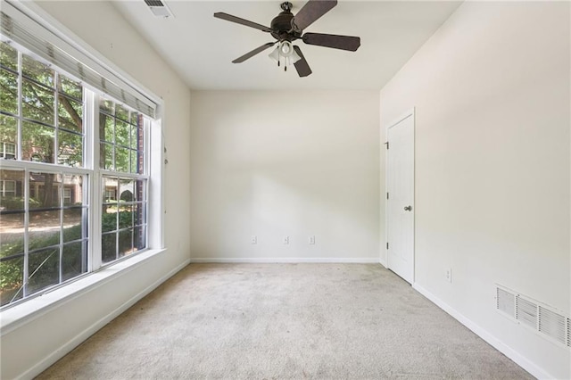 626 Pecan Knoll Dr Unit 13, Marietta, GA 30008 - carpeted empty room with baseboards and a ceiling fan