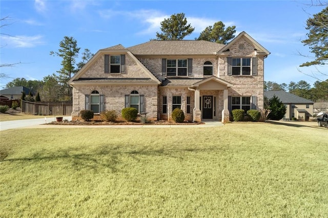 view of front of home with a front lawn