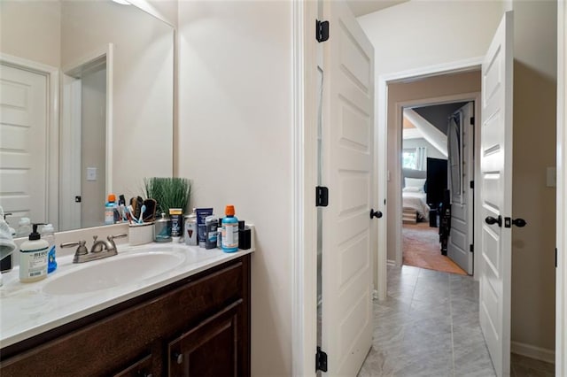 bathroom with vanity and tile patterned floors