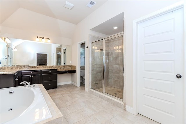 full bathroom featuring a shower stall, toilet, baseboards, vanity, and a garden tub