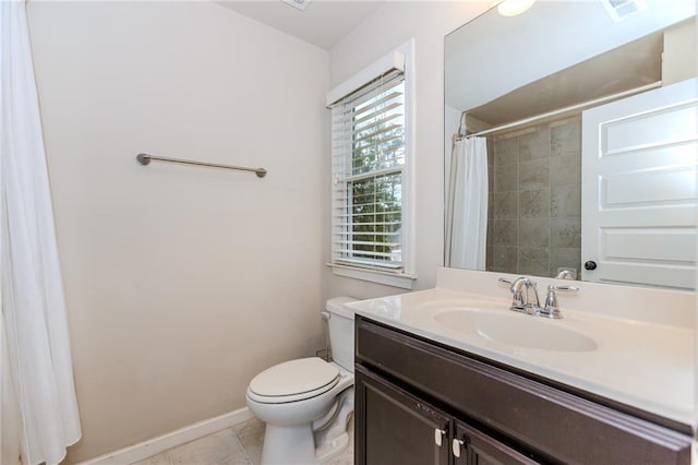 full bath featuring toilet, baseboards, vanity, curtained shower, and tile patterned floors