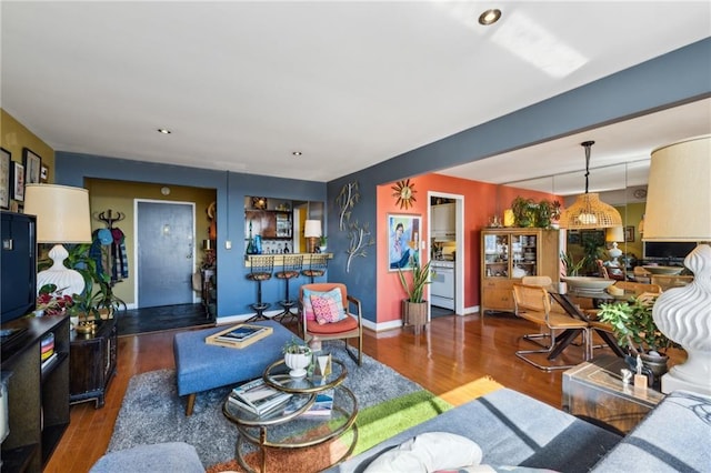 living room featuring dark hardwood / wood-style floors