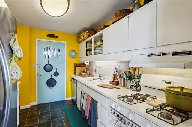 kitchen featuring sink, white cabinets, decorative backsplash, stainless steel dishwasher, and gas range gas stove