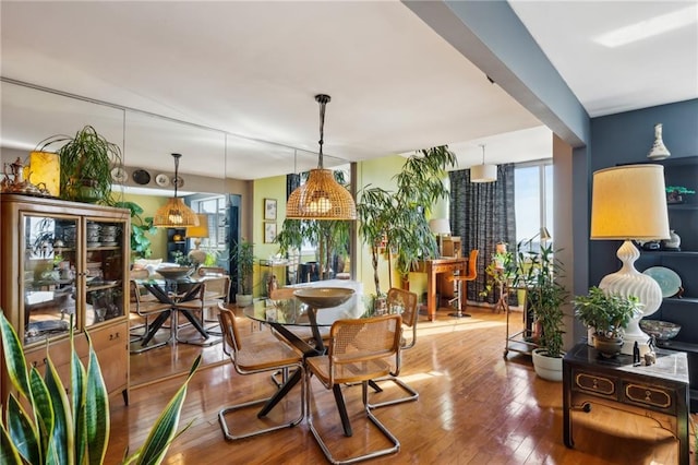 dining area featuring wood-type flooring