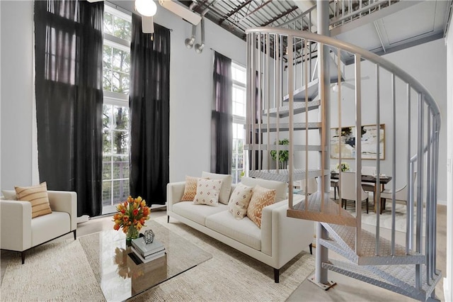 572 Edgewood Ave NE Unit 309, Atlanta, GA 30312 - living room featuring ceiling fan and a high ceiling