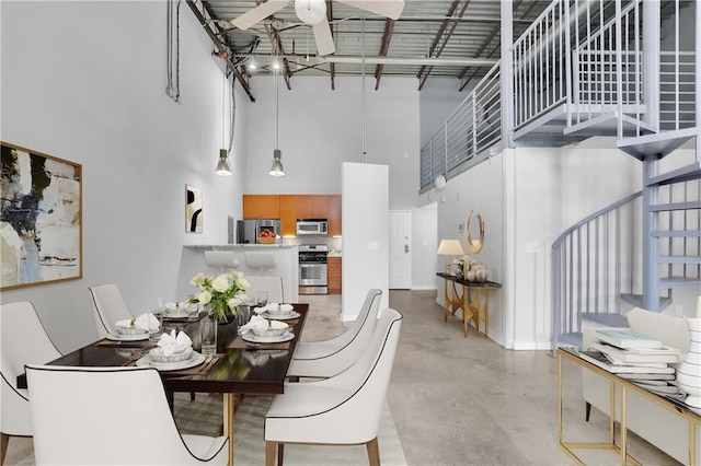 572 Edgewood Ave NE Unit 309, Atlanta, GA 30312 - dining area with a towering ceiling