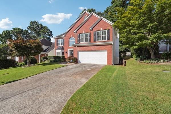 3272 Monarch Pine Dr, Peachtree Corners, GA 30071 - traditional home featuring a garage, concrete driveway, a front lawn, and brick siding