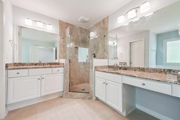 3272 Monarch Pine Dr, Peachtree Corners, GA 30071 - bathroom with a stall shower, tile patterned floors, and two vanities
