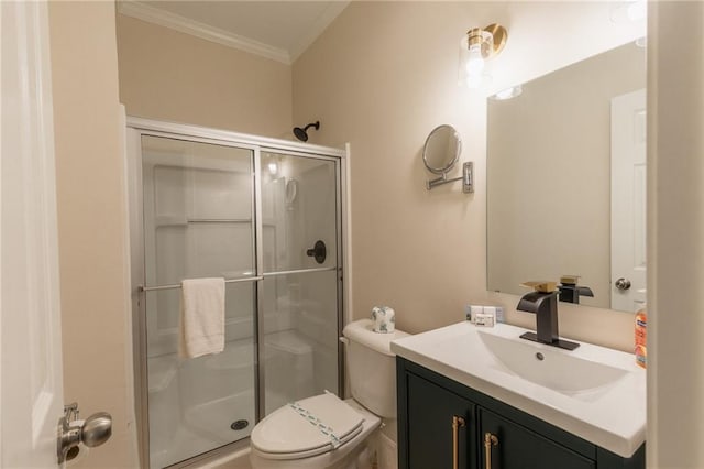 bathroom with vanity, toilet, an enclosed shower, and ornamental molding