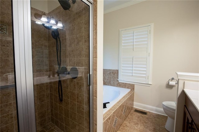 full bathroom with plus walk in shower, tile patterned floors, crown molding, toilet, and vanity