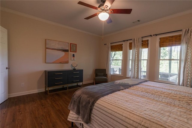 bedroom with dark wood-type flooring, ceiling fan, and ornamental molding