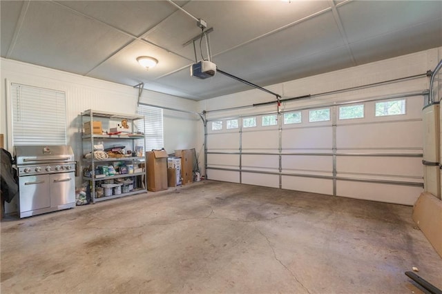 garage featuring a garage door opener