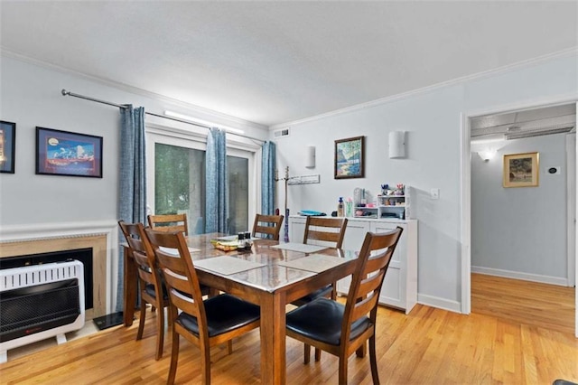 5400 Roswell Rd Apt L6, Sandy Springs, GA 30342 - dining area featuring crown molding and light wood-type flooring