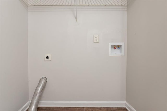 711 Ashley Ln, Stone Mountain, GA 30087 - washroom with electric dryer hookup, washer hookup, and wood finished floors