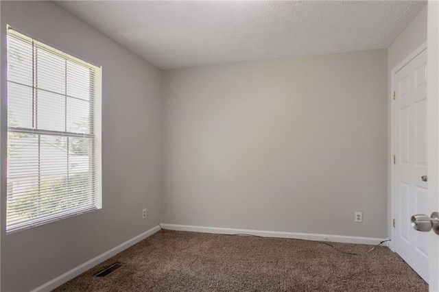 711 Ashley Ln, Stone Mountain, GA 30087 - carpeted spare room featuring healthy amount of natural light