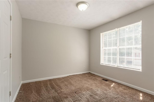 711 Ashley Ln, Stone Mountain, GA 30087 - carpeted spare room with baseboards