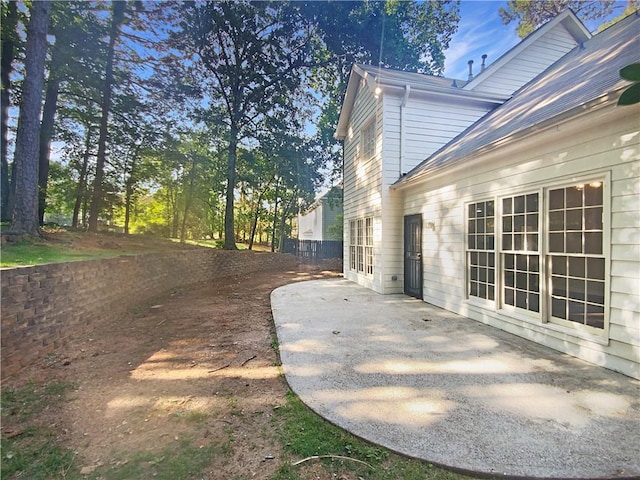 view of home's exterior with a patio