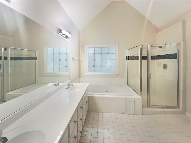 bathroom featuring separate shower and tub, tile patterned floors, vanity, and vaulted ceiling