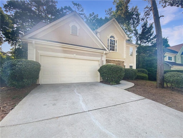 view of front of property featuring a garage