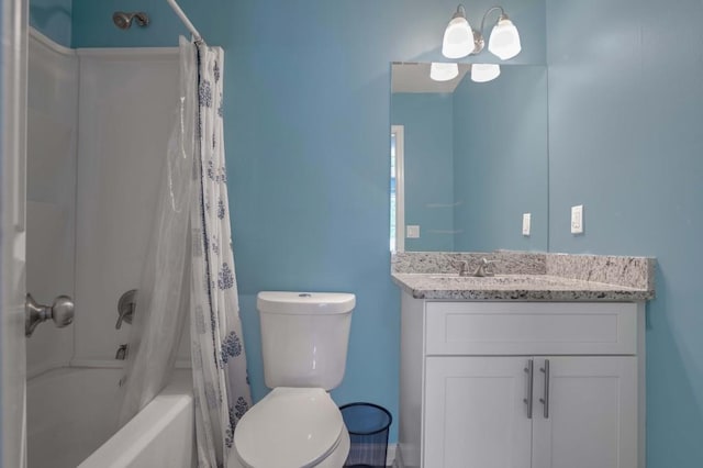 full bathroom with vanity, toilet, and shower / bath combo with shower curtain