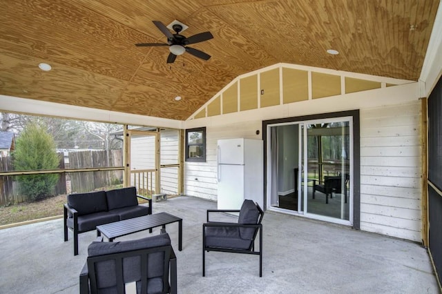 sunroom / solarium featuring ceiling fan, wooden ceiling, and vaulted ceiling