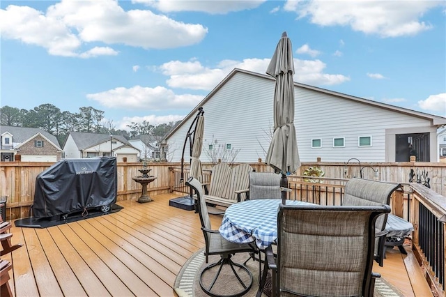 wooden terrace with grilling area