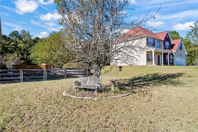 view of yard with a garage