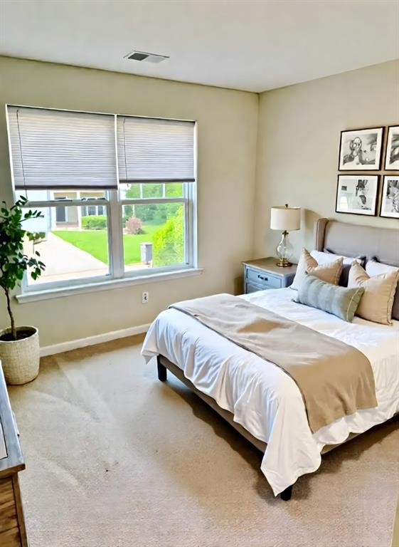 377 Fieldcrest Dr, Dallas, GA 30132 - carpeted bedroom with baseboards
