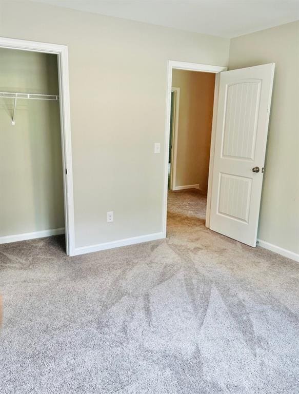377 Fieldcrest Dr, Dallas, GA 30132 - unfurnished bedroom featuring carpet flooring, a closet, and baseboards