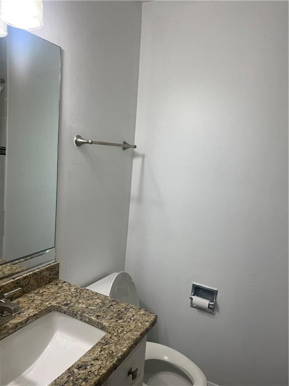 23210 Plantation Dr NE, Atlanta, GA 30324 - bathroom featuring vanity and toilet