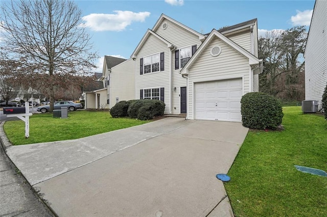 traditional-style house with a garage, central AC unit, concrete driveway, and a front yard