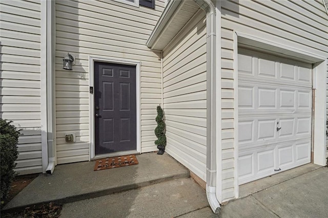 entrance to property with a garage