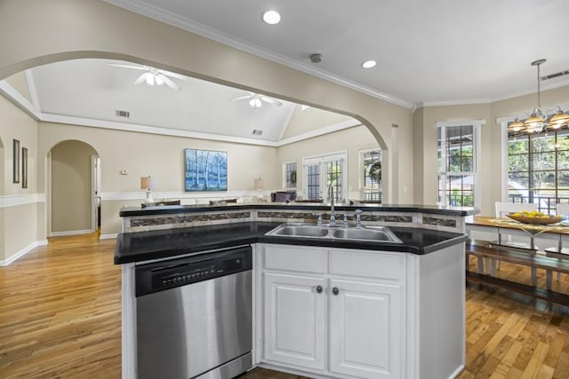 kitchen with ceiling fan with notable chandelier, light hardwood / wood-style floors, white cabinetry, sink, and stainless steel dishwasher