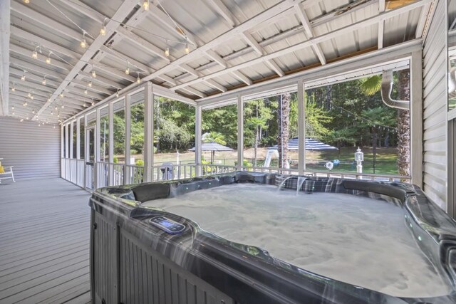 exterior space featuring a jacuzzi
