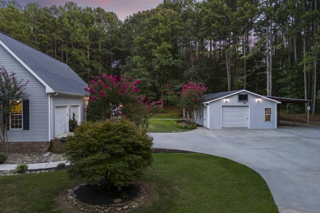 yard at dusk with an outdoor structure