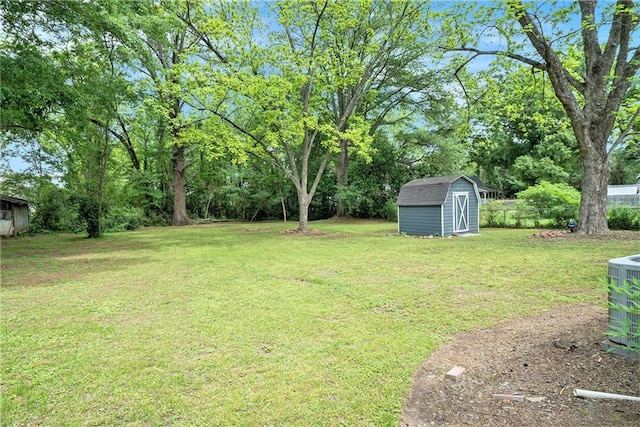 121 Norris St, Monroe, GA 30655 - exterior space with a chimney, a storage unit, fence, cooling unit, and an outdoor structure