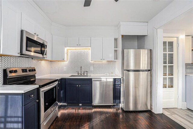 121 Norris St, Monroe, GA 30655 - bedroom featuring visible vents, crown molding, baseboards, and wood finished floors