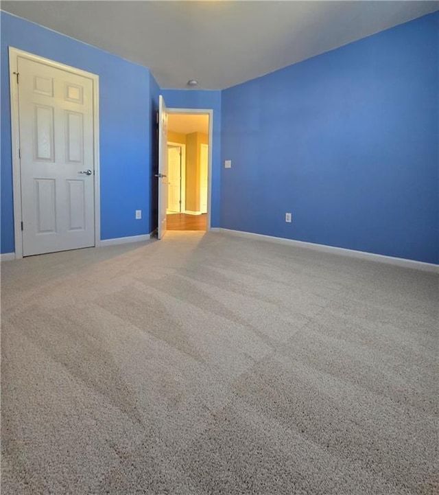 spare room with carpet floors