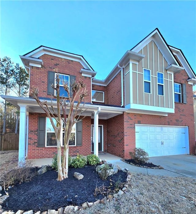 view of front of property with a garage